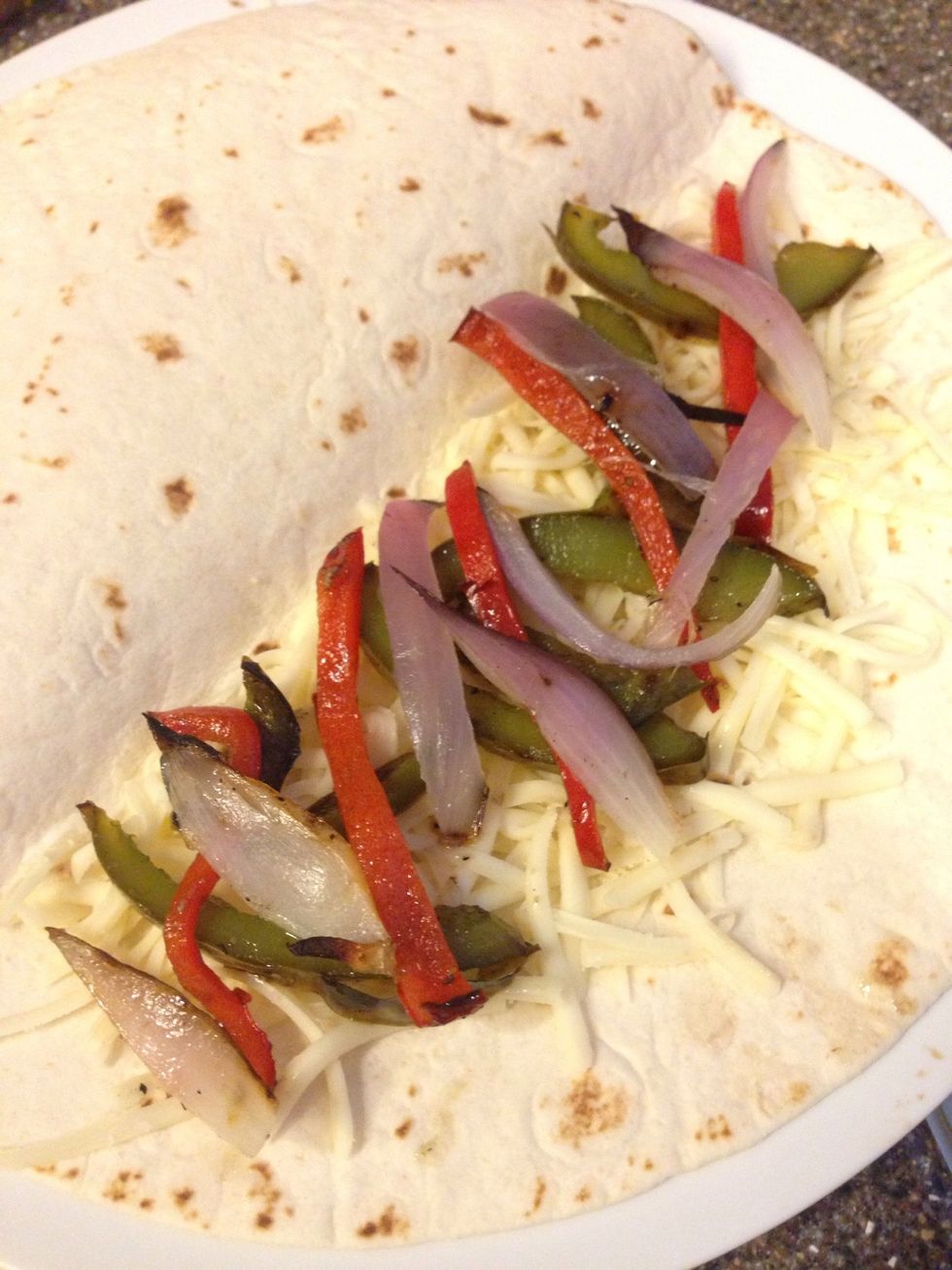 Slice up the grilled veggies as well & start loading up your quesadillas.