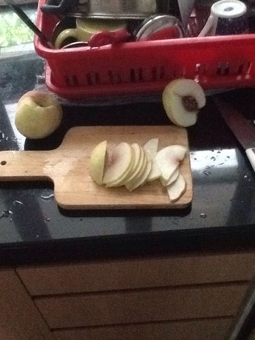 Slice ur peach. I use white longevity chinese peach. Cos i prefer not too sweet cobbler. (The can yellow peaches r quite sweet, if u like sweet go for it)