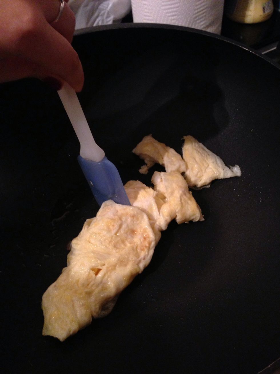 Slice with your spatula into small chunks suitable for egg fried rice.