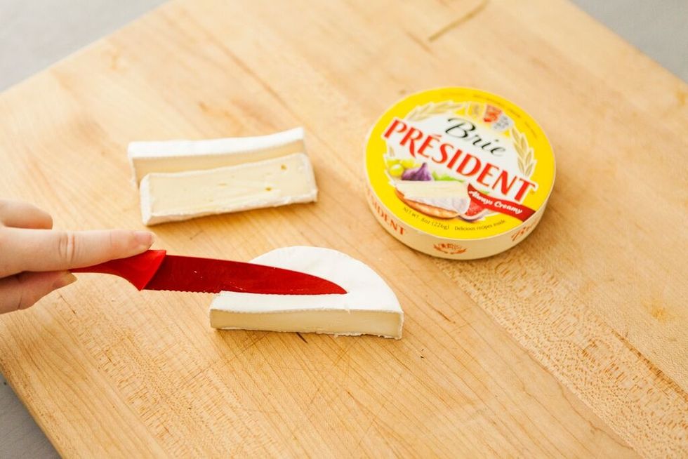 Slice your brie into thin rectangular slices.