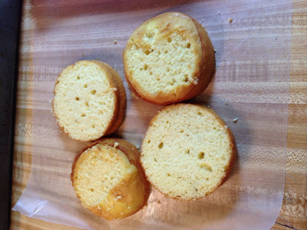 Slice your cakes in half and slice off the round tops. That gives you a chance to make sure your cake is as yummy as it smells!
