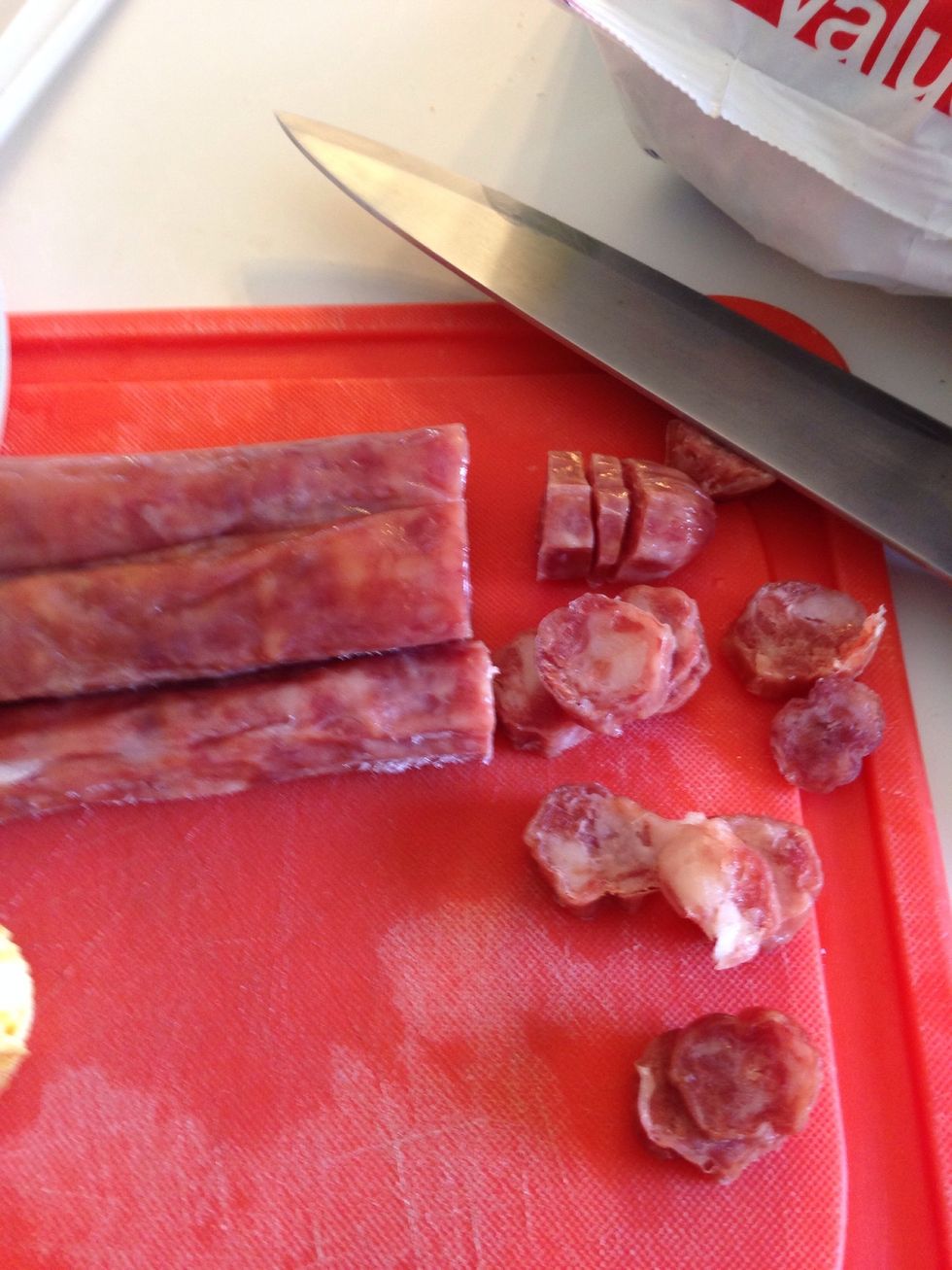 Slice your Chinese sausage. I use about 5