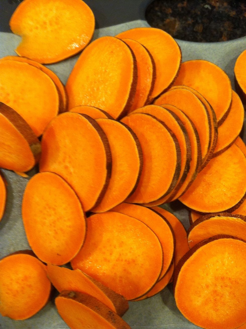 Slice your sweet potato into 1/8 inch slices. 1/4 inch slices will work, too, but they will need additional cooking time.