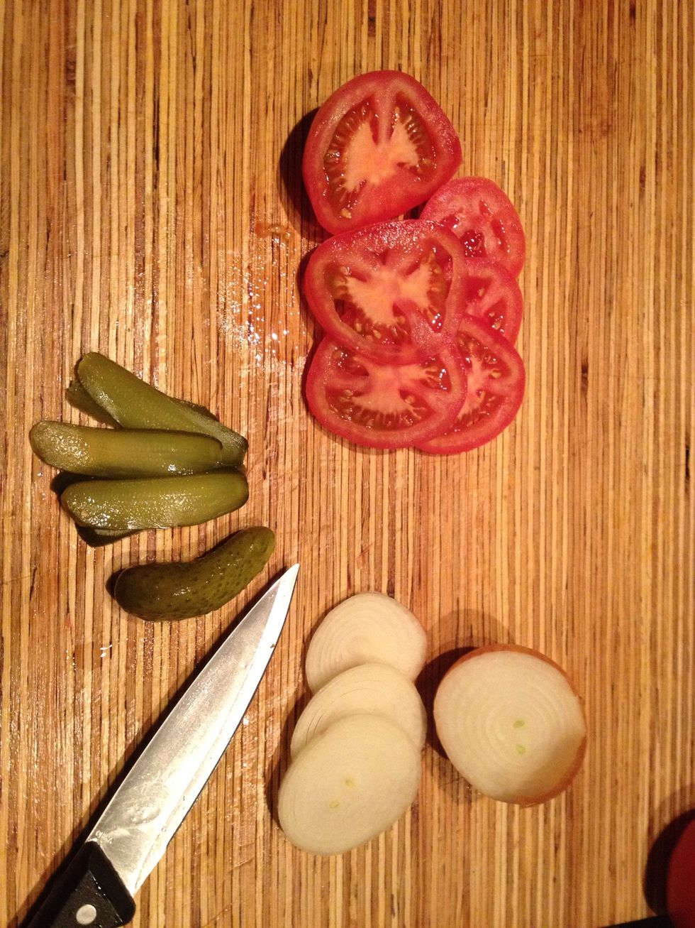 Slice your tomato onion and gherkins