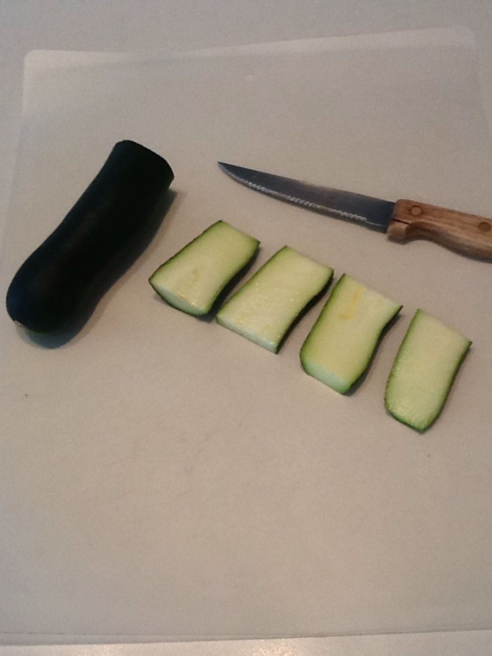Slice zucchini into strips
