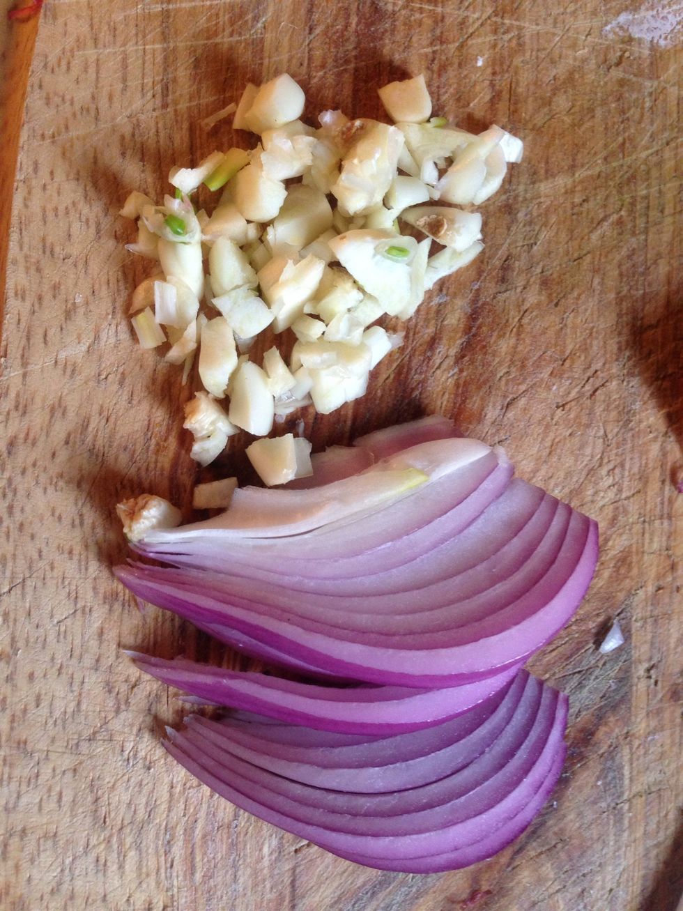 Sliced and diced your garlic and onions.