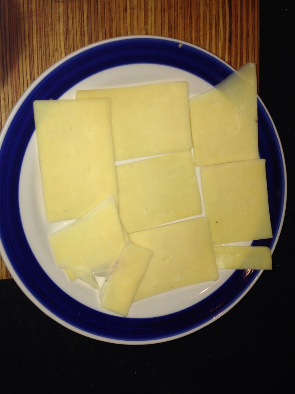 Sliced cheese on a plate