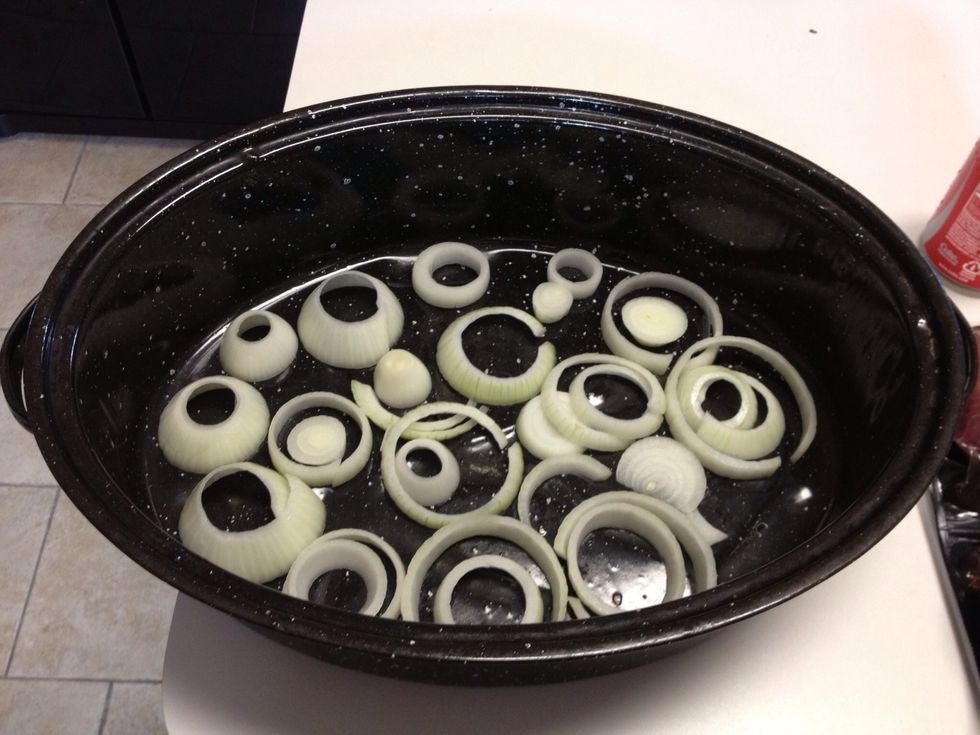 Sliced onion, place 1/2 on bottom.
