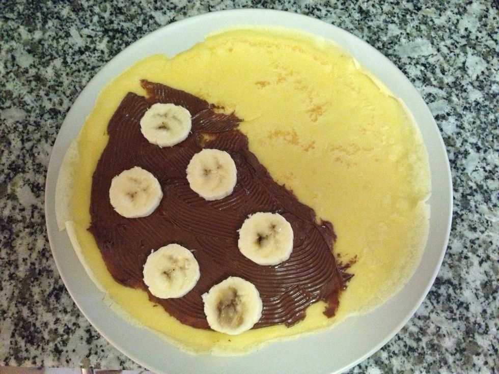 Sliced some bananas and put them on top of the Nutella.