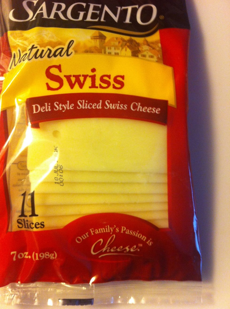 Sliced Swiss cheese. One slice for each sandwich