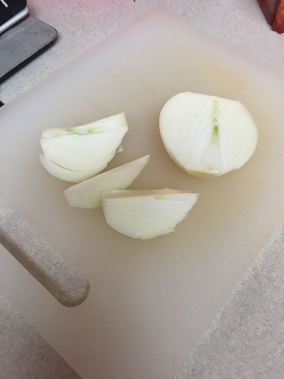 Sliced yellow onion, half to boil meat, half to marinate shrimp