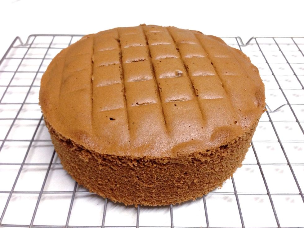 Slide a cake into 2 layers.