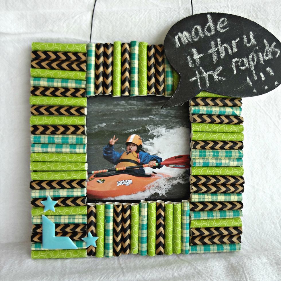 Slide a photo into the envelope pocket. Add a caption with chalk.
