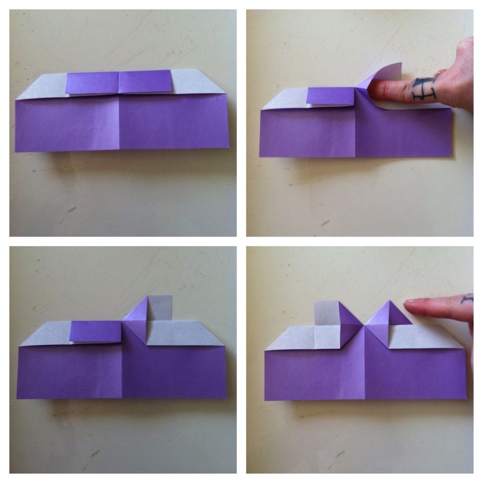 Slide finger under flap as shown & squash flat. Repeat on left side. Now fold top right corner down as shown. Repeat on left side...