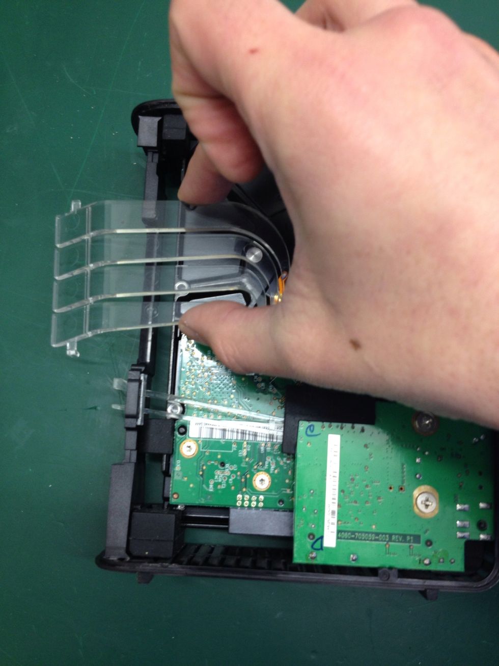 Slide it then to the left to release it from the chassis and set it aside.