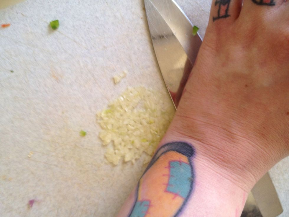 Slide knife with dull side to make a paste.