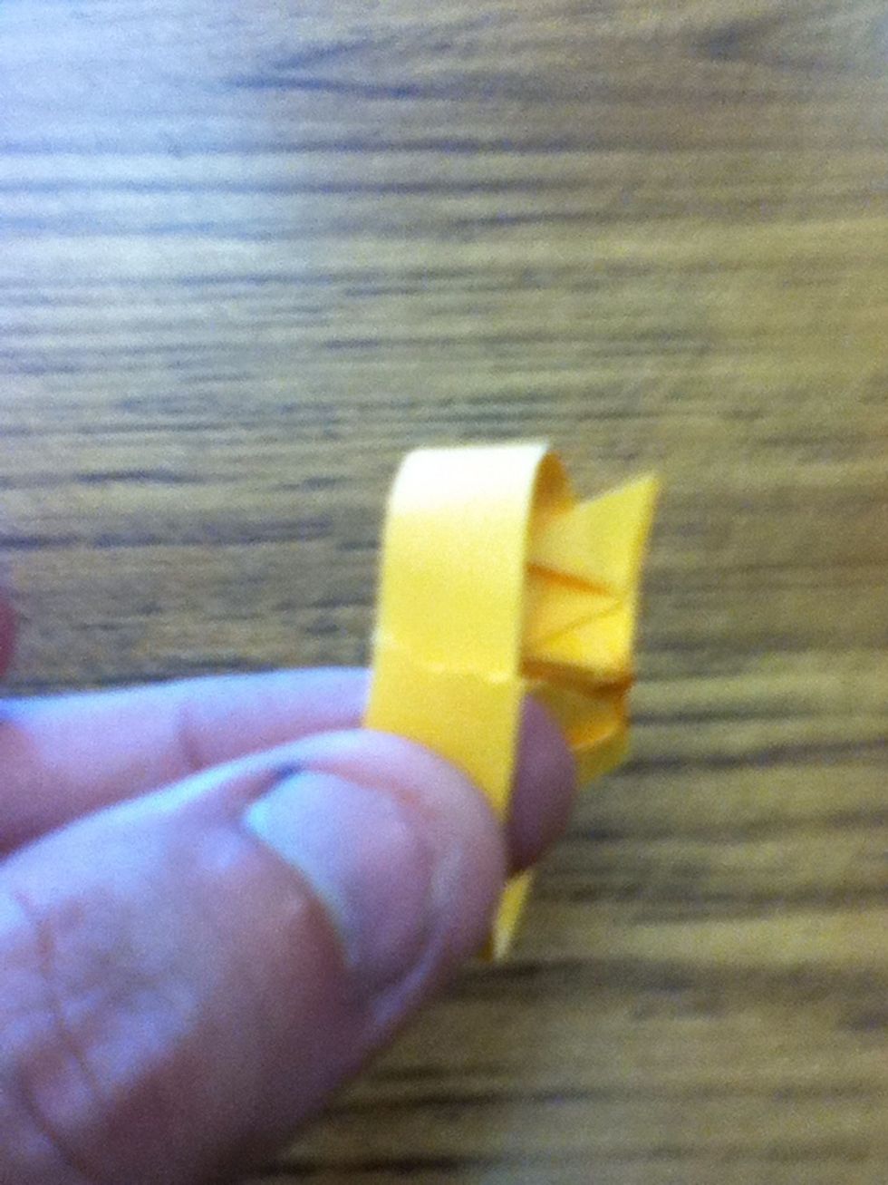 Slide one end into the other.
