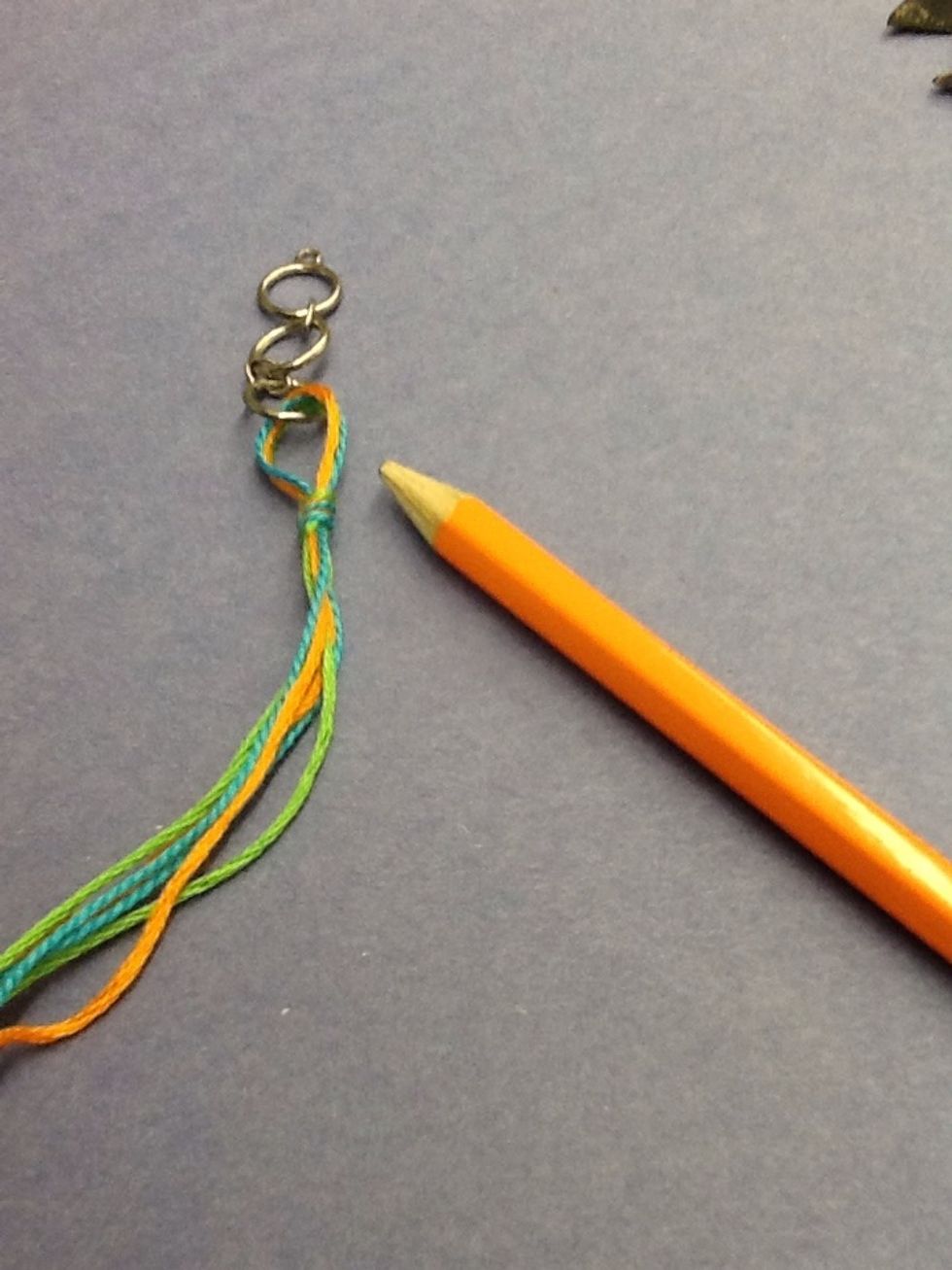 Slide out the pencil and now you have a loop.