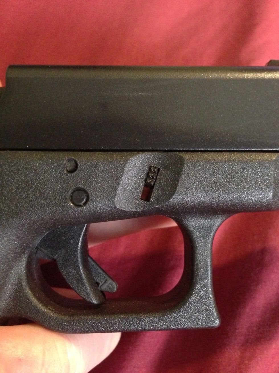 Slide stop lever close up.