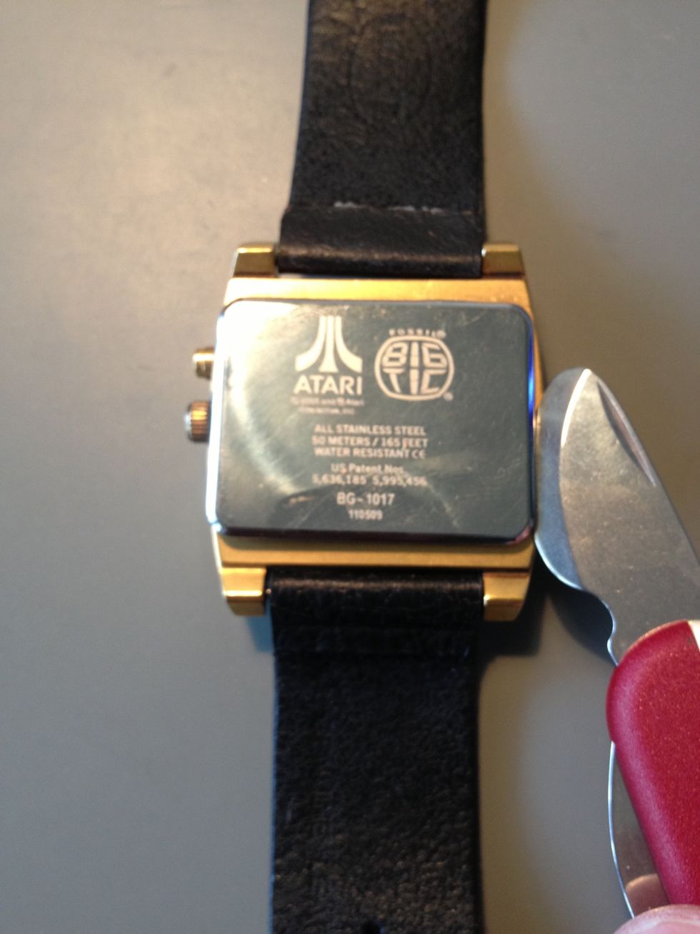 Slide the blade to another side of the back to remove it completely.