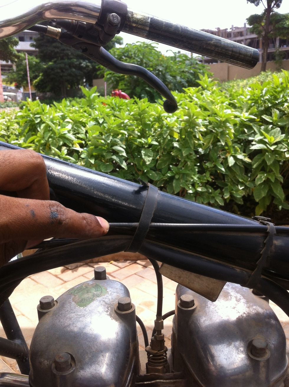 Slide the cable out of the cable holders.