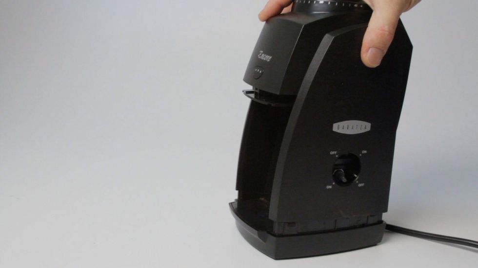 Slide the case back over the top. Push down firmly to re-engage the case clips.