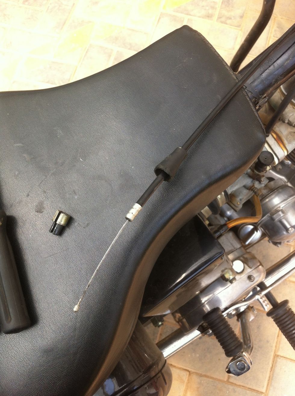 Slide the cone cap onto the cable sleeve.