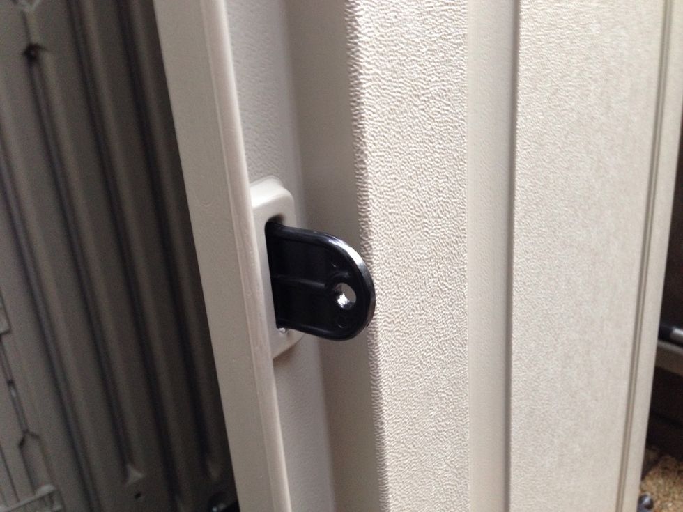 Slide the latch into place.