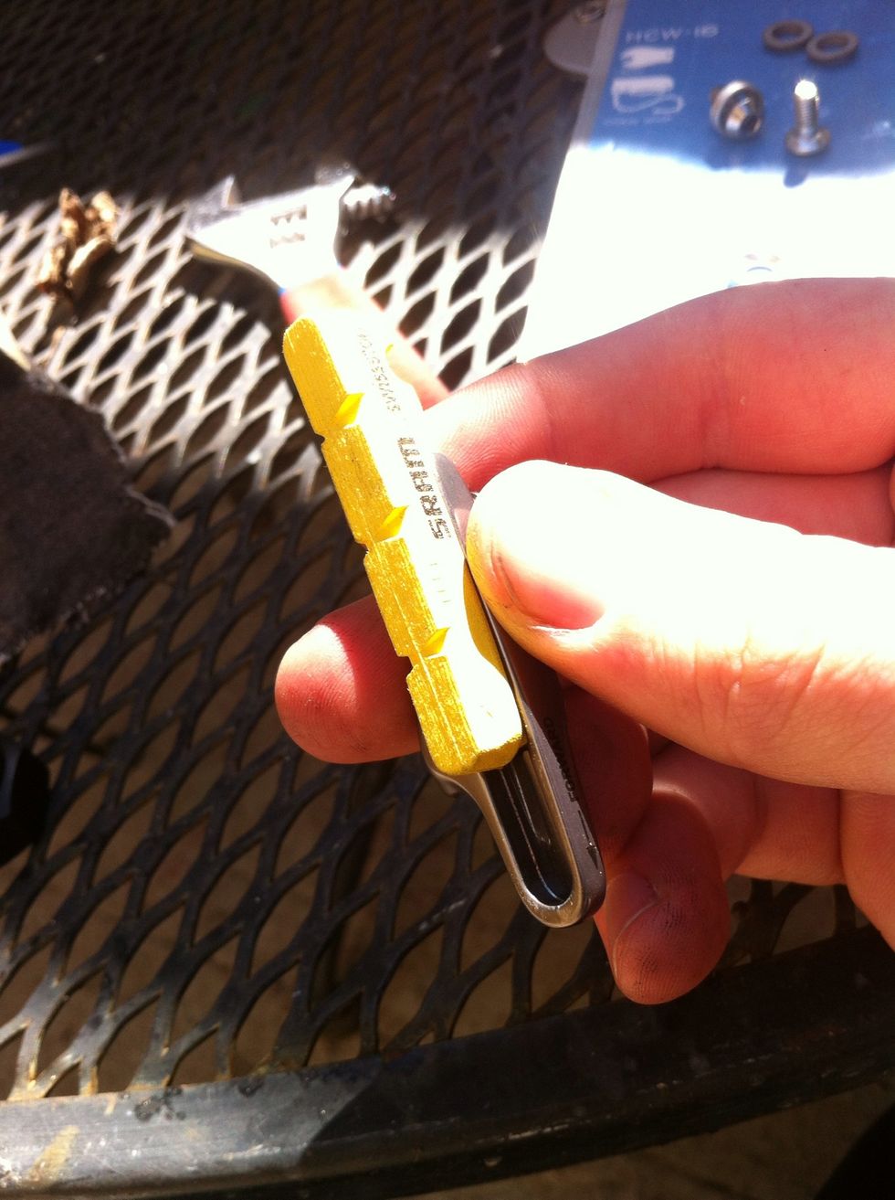 slide the new brake pad in.