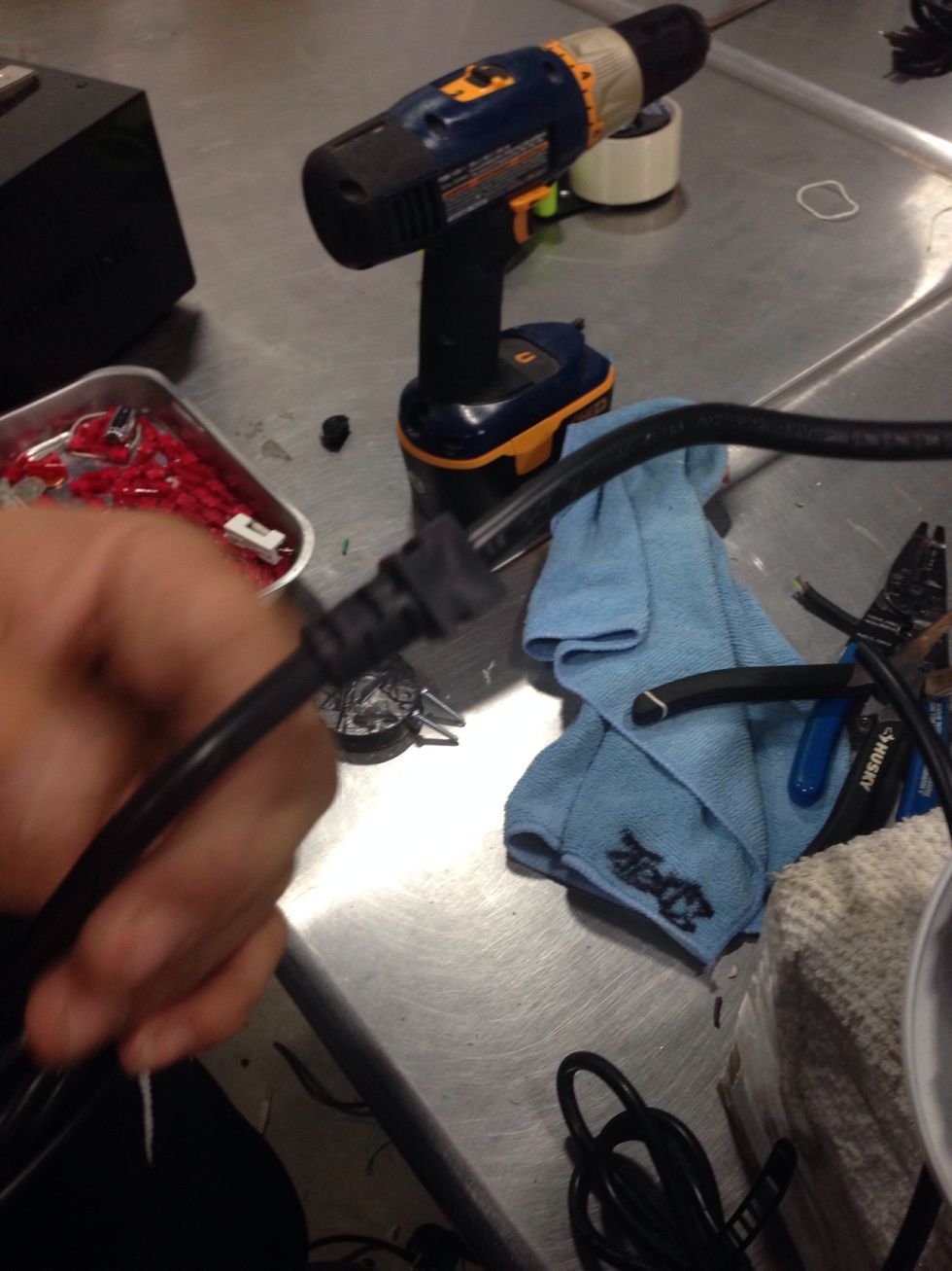 Slide the tension relief down onto the new cord