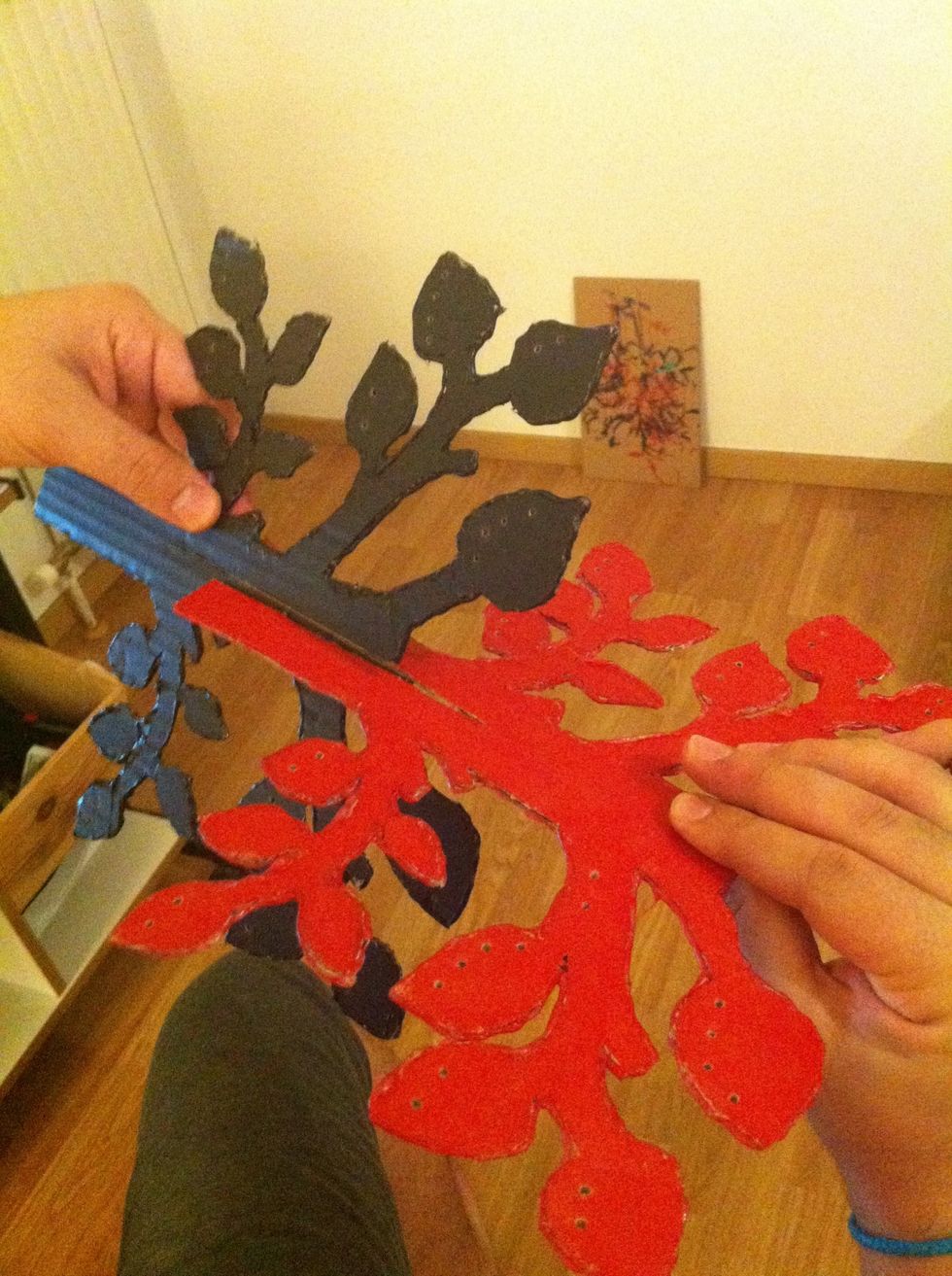 Slide them together. Do not push very hard, not to rip the apart. (Those are not my hands \ud83d\ude1c) If they do not slide in perfectly, make the slits a bit longer.