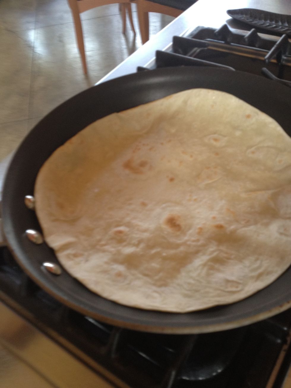 Slightly brown flour tortilla shells and set aside