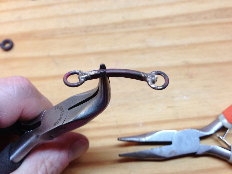 Slightly curve each link like this.