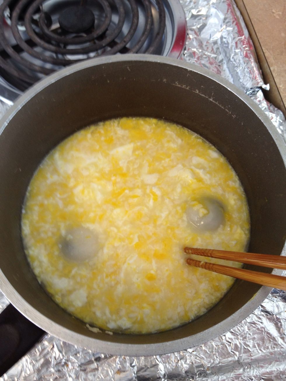 Slightly stir the eggs and it'll turn out evenly and beautifully. White is white, yellow is yellow. We call it "egg flower" \u86cb\u82b1, ha.