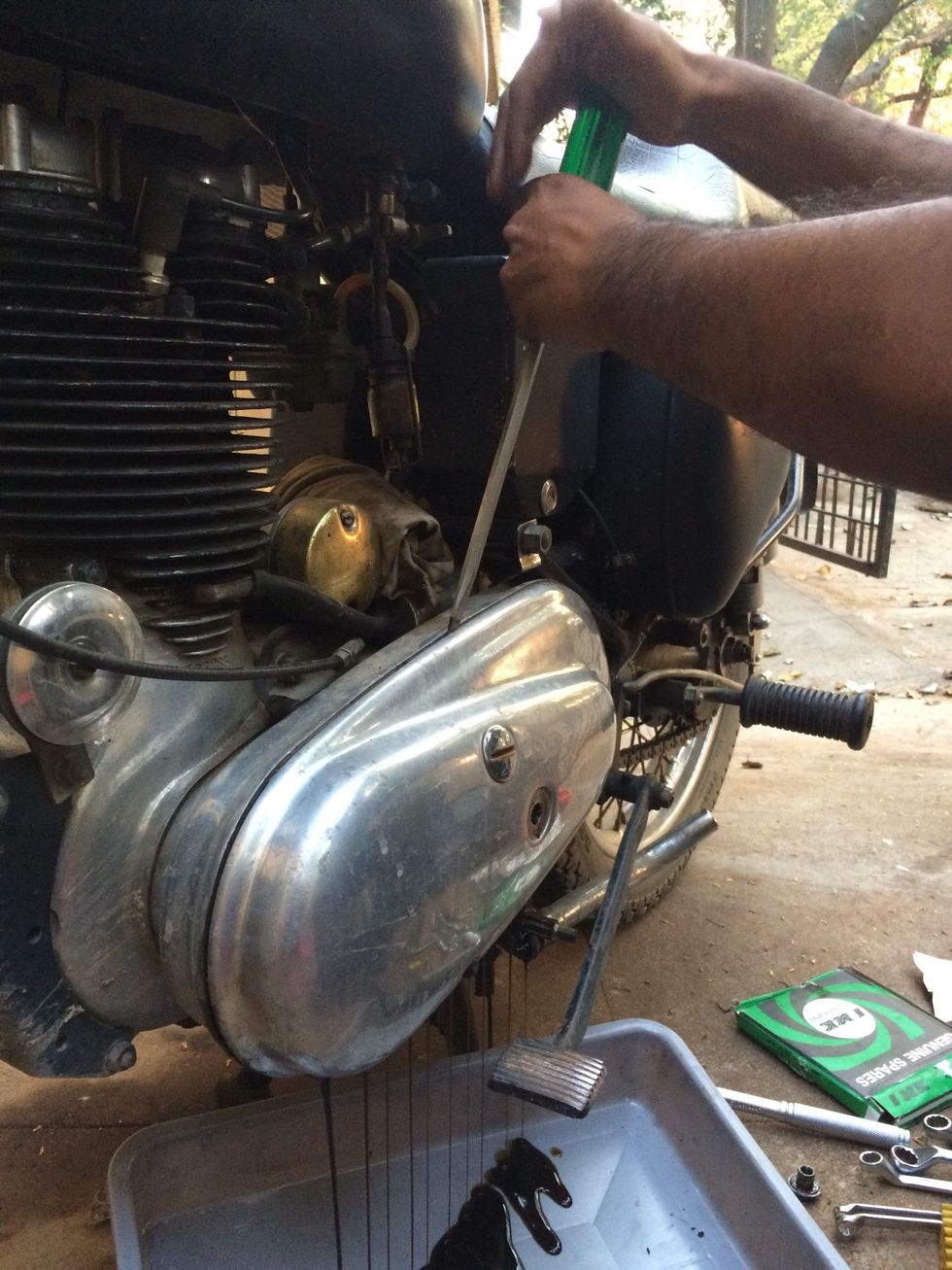 Slightly wedge the case out using a blunt screwdriver. Take care that you don't damage the O-ring