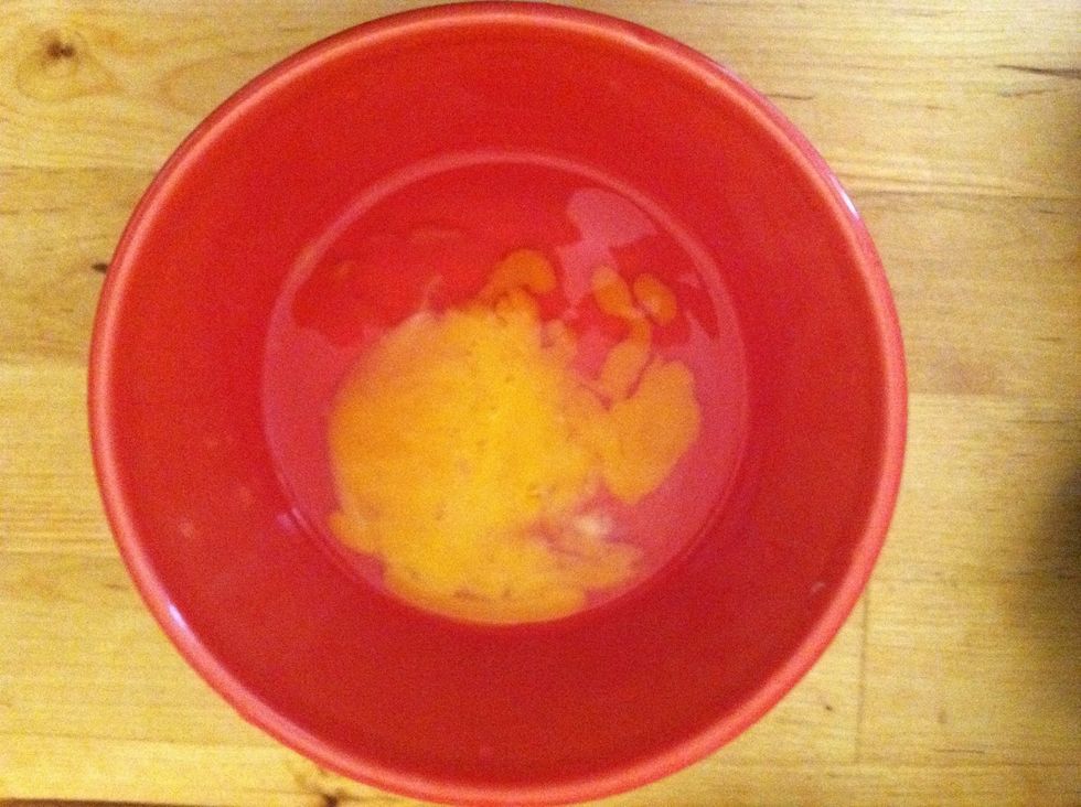 Slighty beat the egg with a fork.