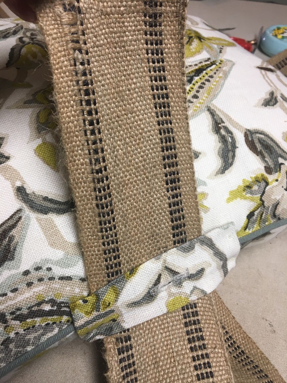 Slip each strip of the banding up through each tab and pull out the slack.