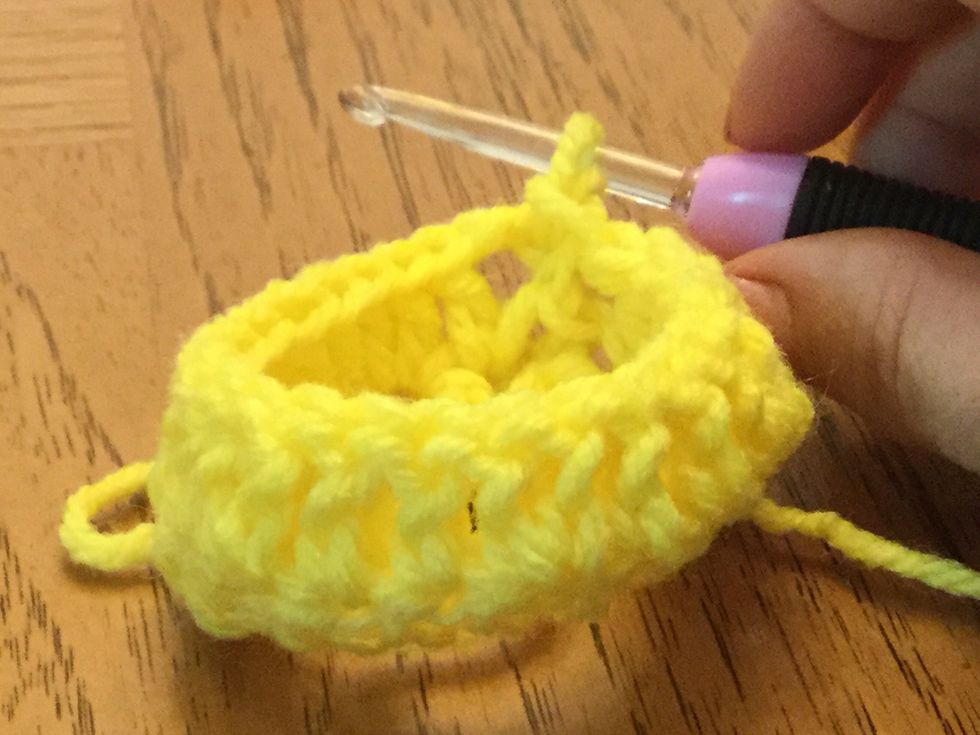 Slip stick through 2nd chain for chain 3 to complete row.