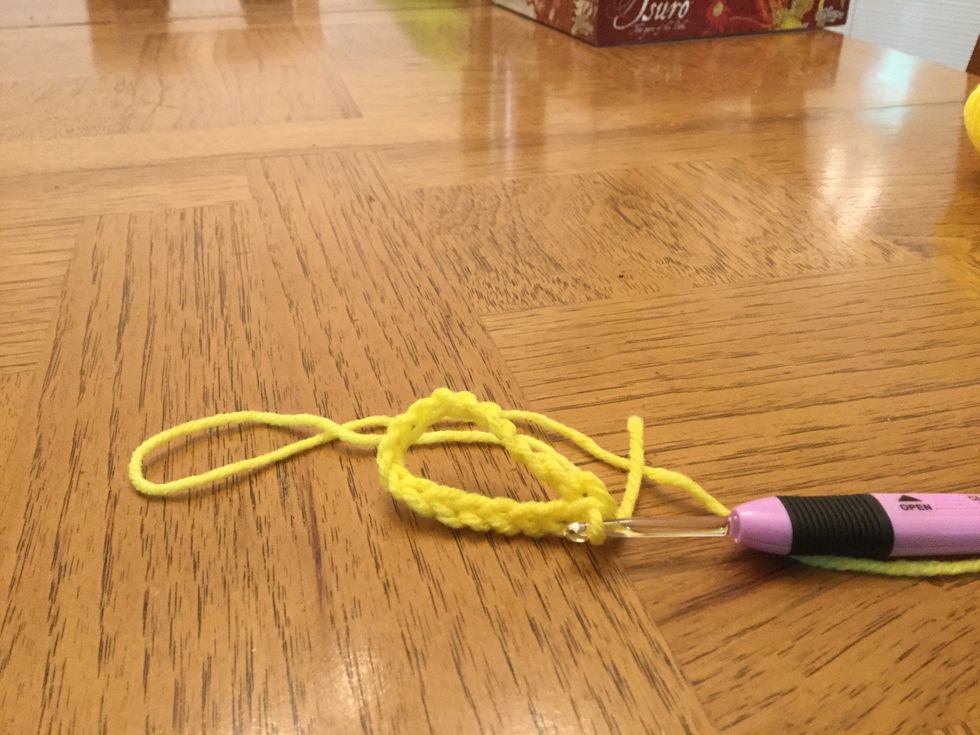 Slip stick through the first stick making sure to not twist the chain.