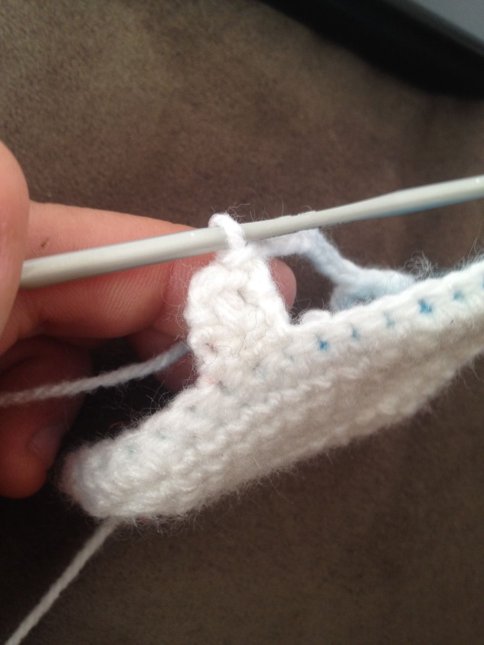 Slip stitch the 9 you just chairs to the first stitch of the right strap