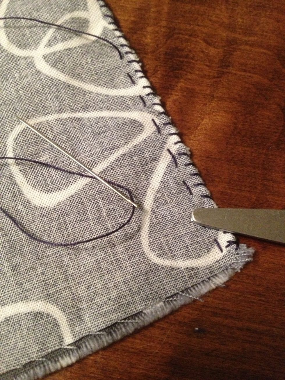 Slip stitch the edges, and then use a running stitch. This helps secure the pieces like a machine stitch. If you want, you can go over the running stitch to re-enforce.