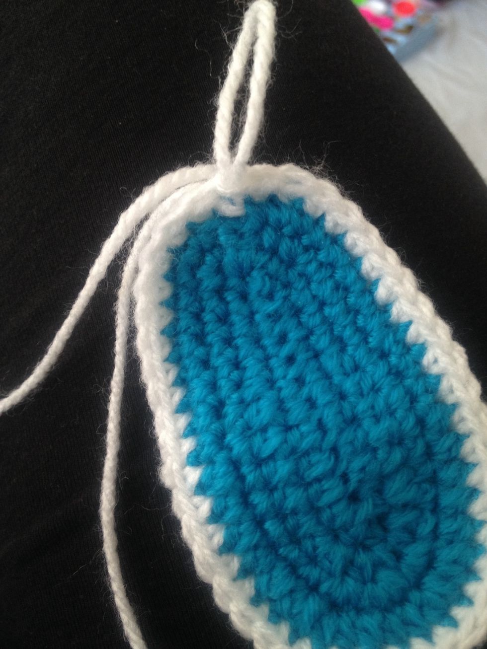 Slip stitch to the first stitch where you started and pull firm