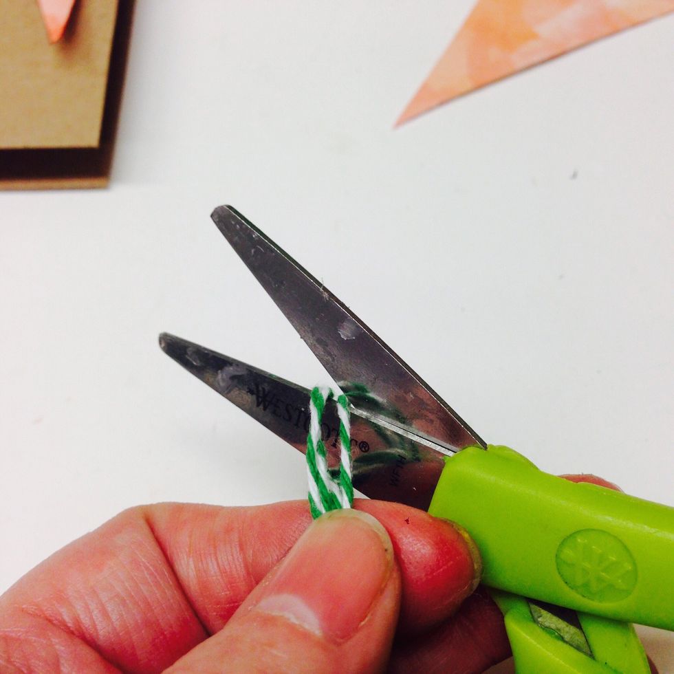 Slip the loops off of the ruler, and cut apart at the top.