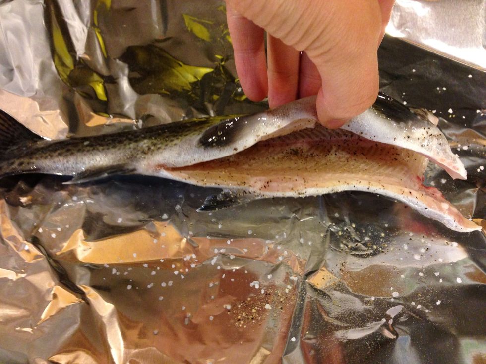 Slit the inside, sprinkle with salt and pepper then add any flavorings you'd like.