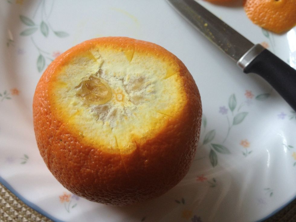 Slit the peels all around, about an inch apart. Make sure to slit only the peels; dont cut the pulp