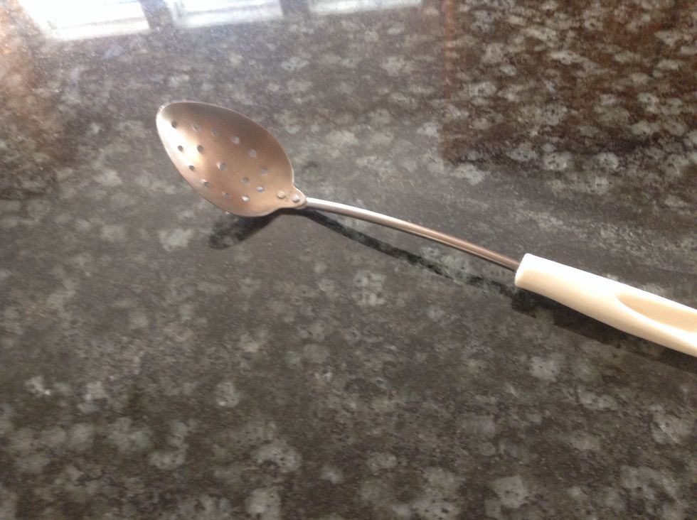 Slotted Spoon. Used to take an item out of a pot, and leave the liquid behind. I can use a slotted spoon to remove an item out of a pot.