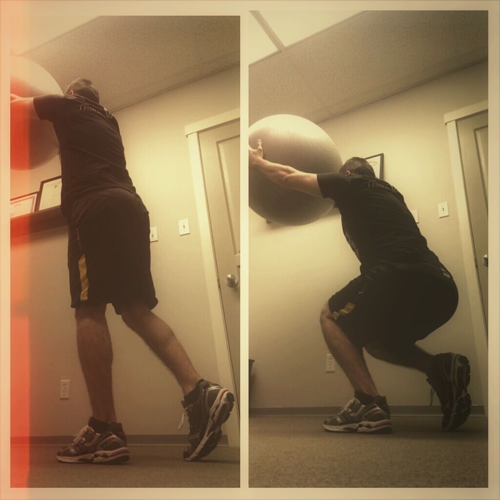 Slow motion overhead squat X10 per leg. Hold the ball at a 45 degrees. With 80% of your weight on the heel of one foot with the other 20% on the toe of the other foot, slowly drop into a squat.