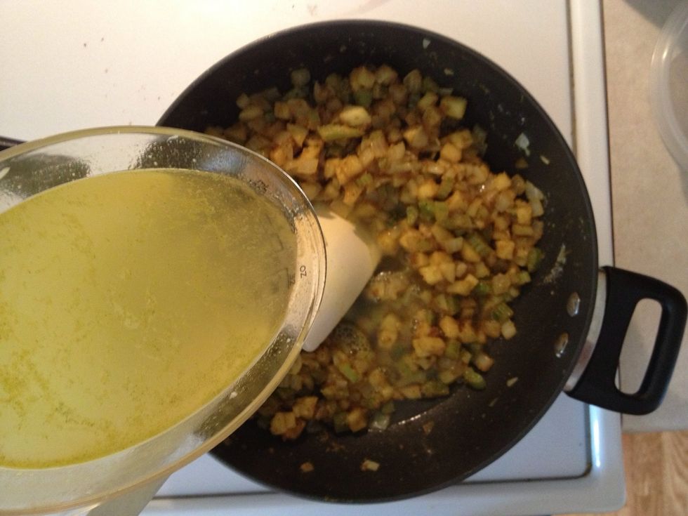 Slowly add chicken stock