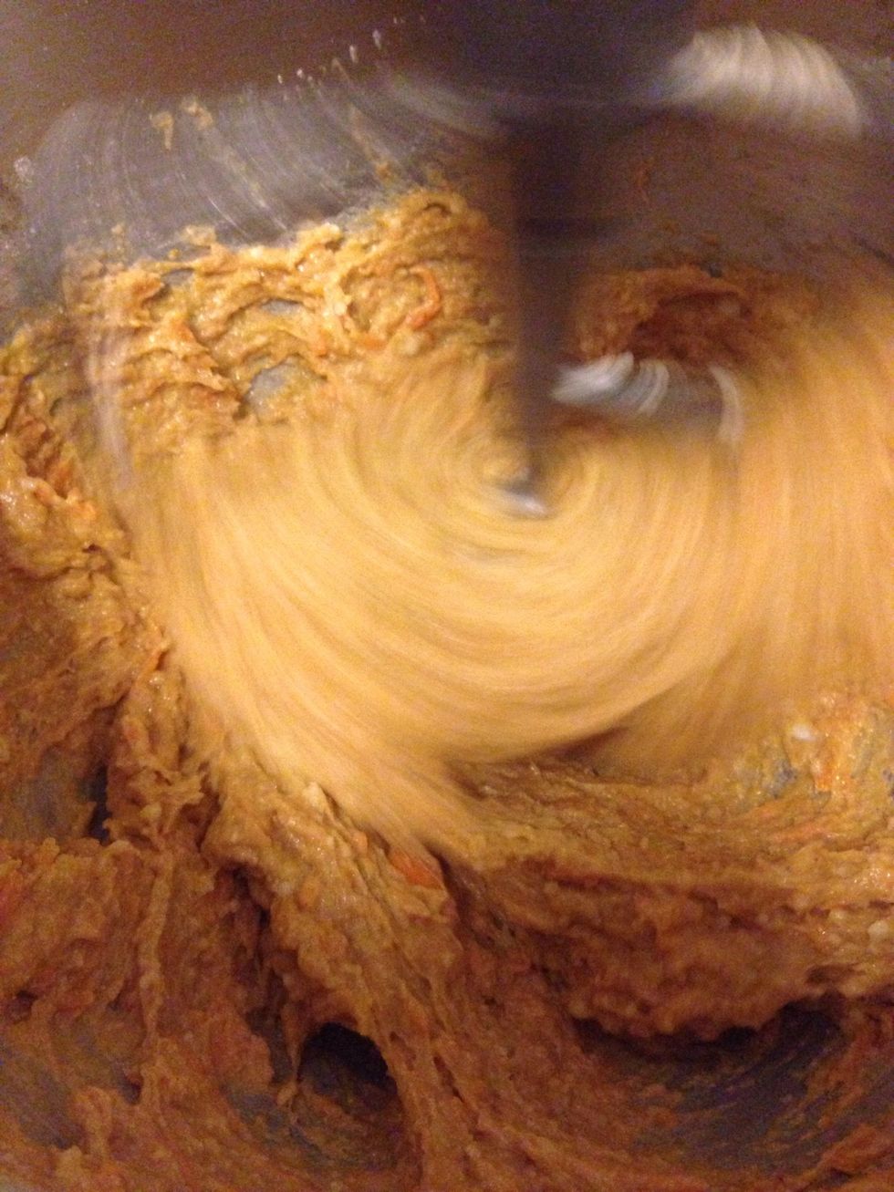 Slowly add dry ingredients and mix on low speed until JUST combined. If you over-mix, your muffins will be more dense and dry.