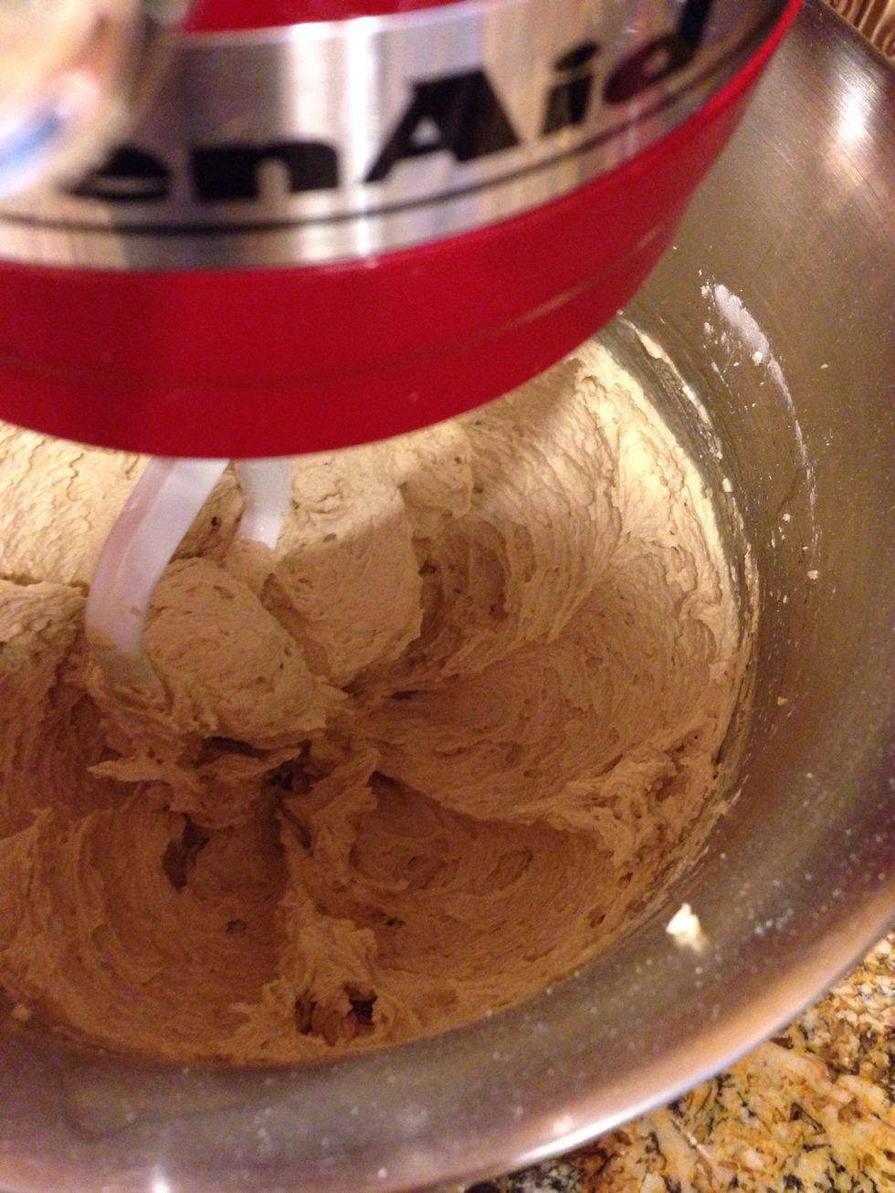 Slowly add eggs, 1 by 1, and vanilla.
